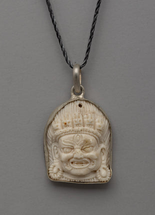 Hand-Carved Bhairav Locket with Five-Skull Crown 