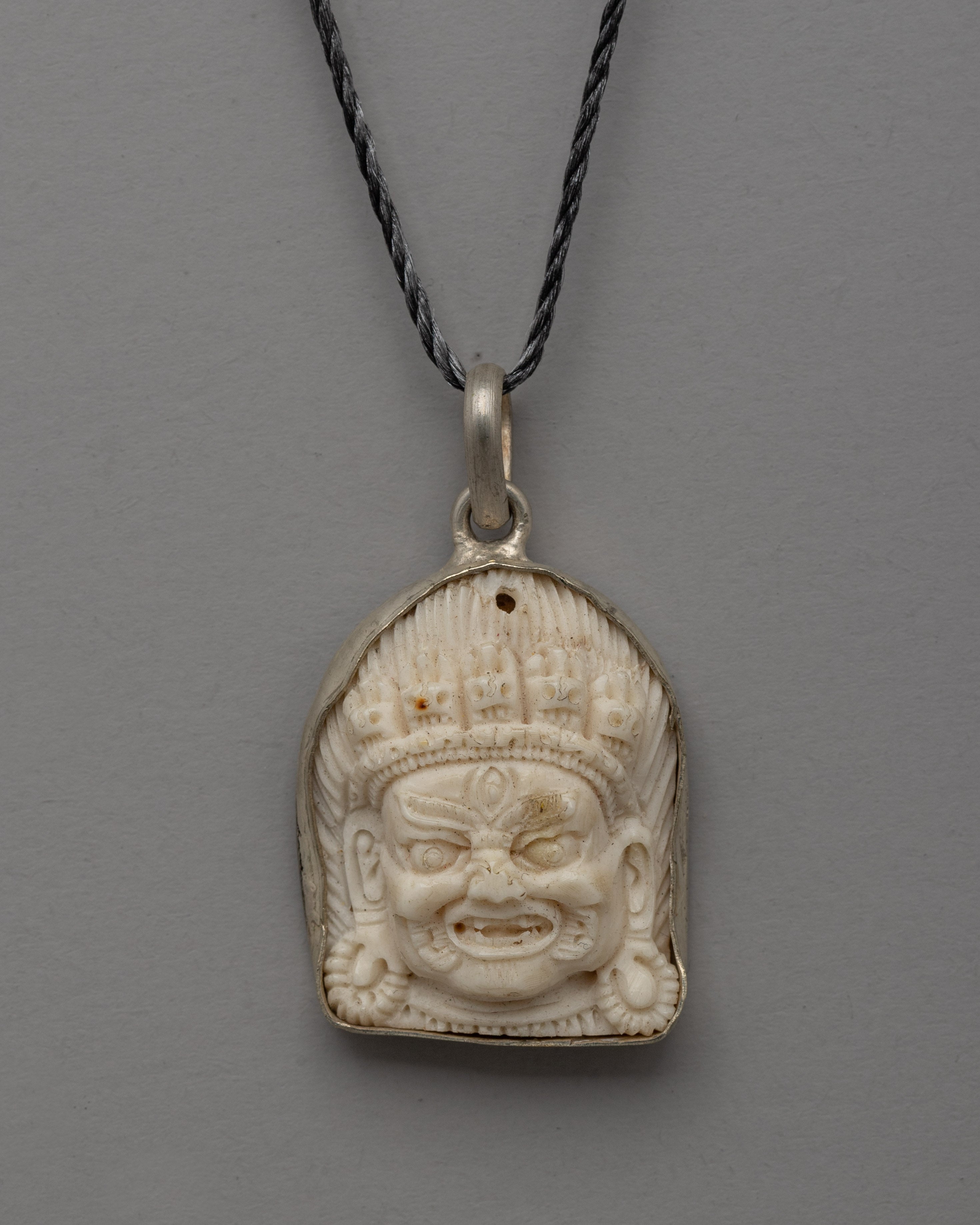 Hand-Carved Bhairav Locket with Five-Skull Crown 