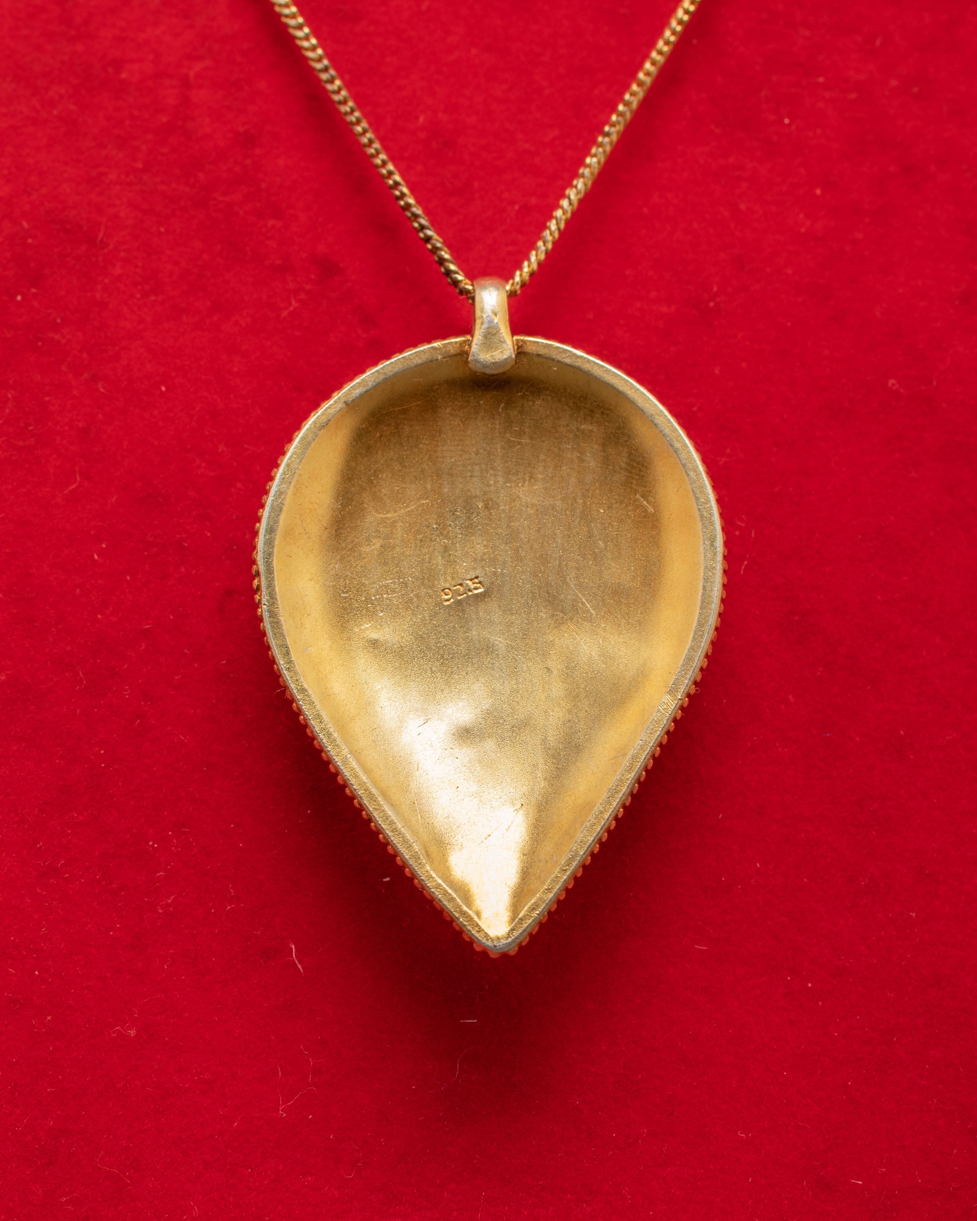 Ruby Locket with Gold Plating | Spiritual Ruby Jewelry