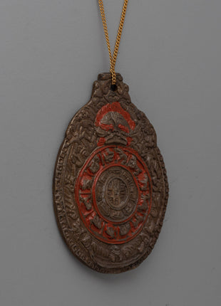 Handcrafted Buddhist Brass Locket with Sacred Symbols | Antique Spiritual Jewelry