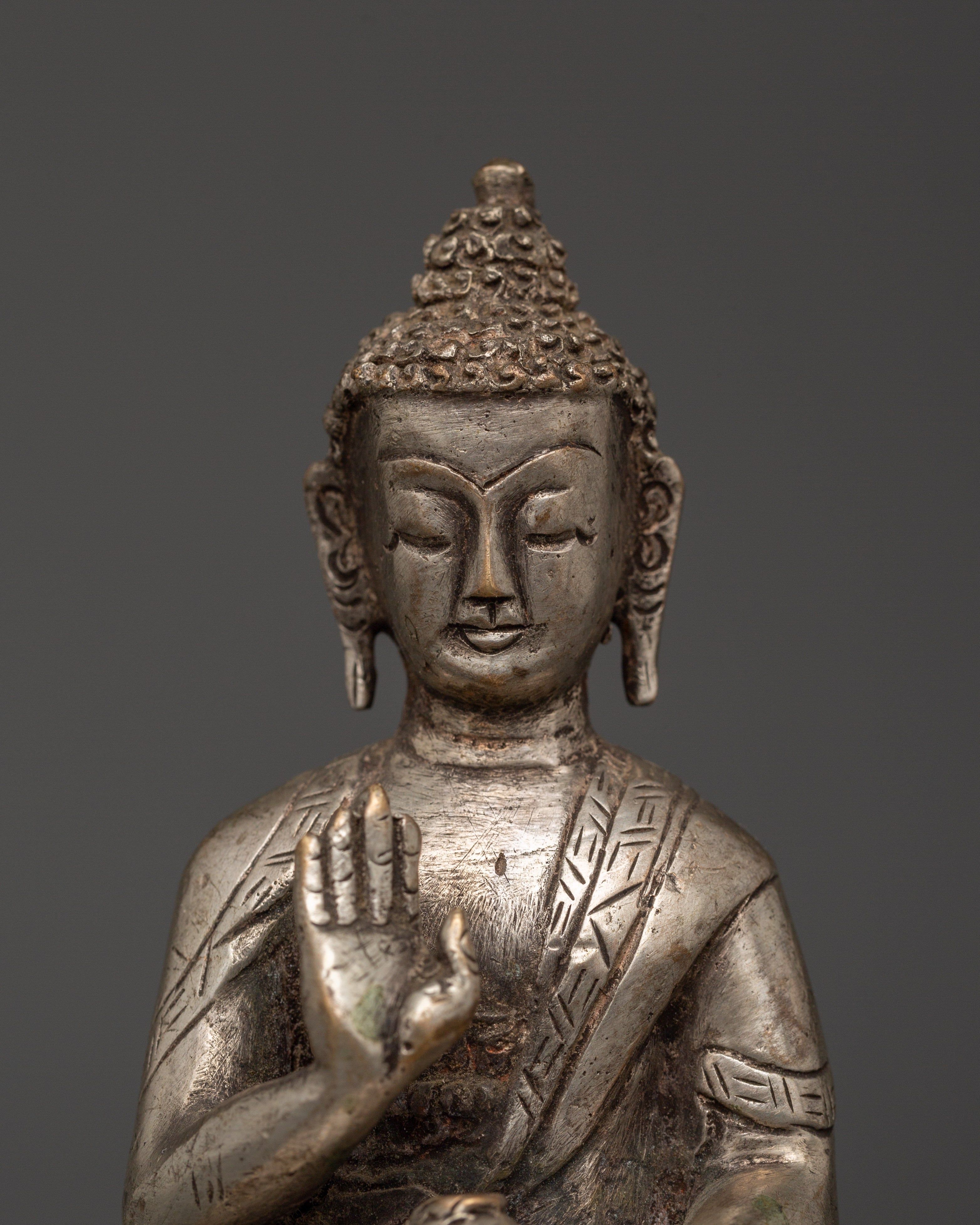 Handmade Amoghasiddhi Buddha Statue | Silver-Plated Copper Body