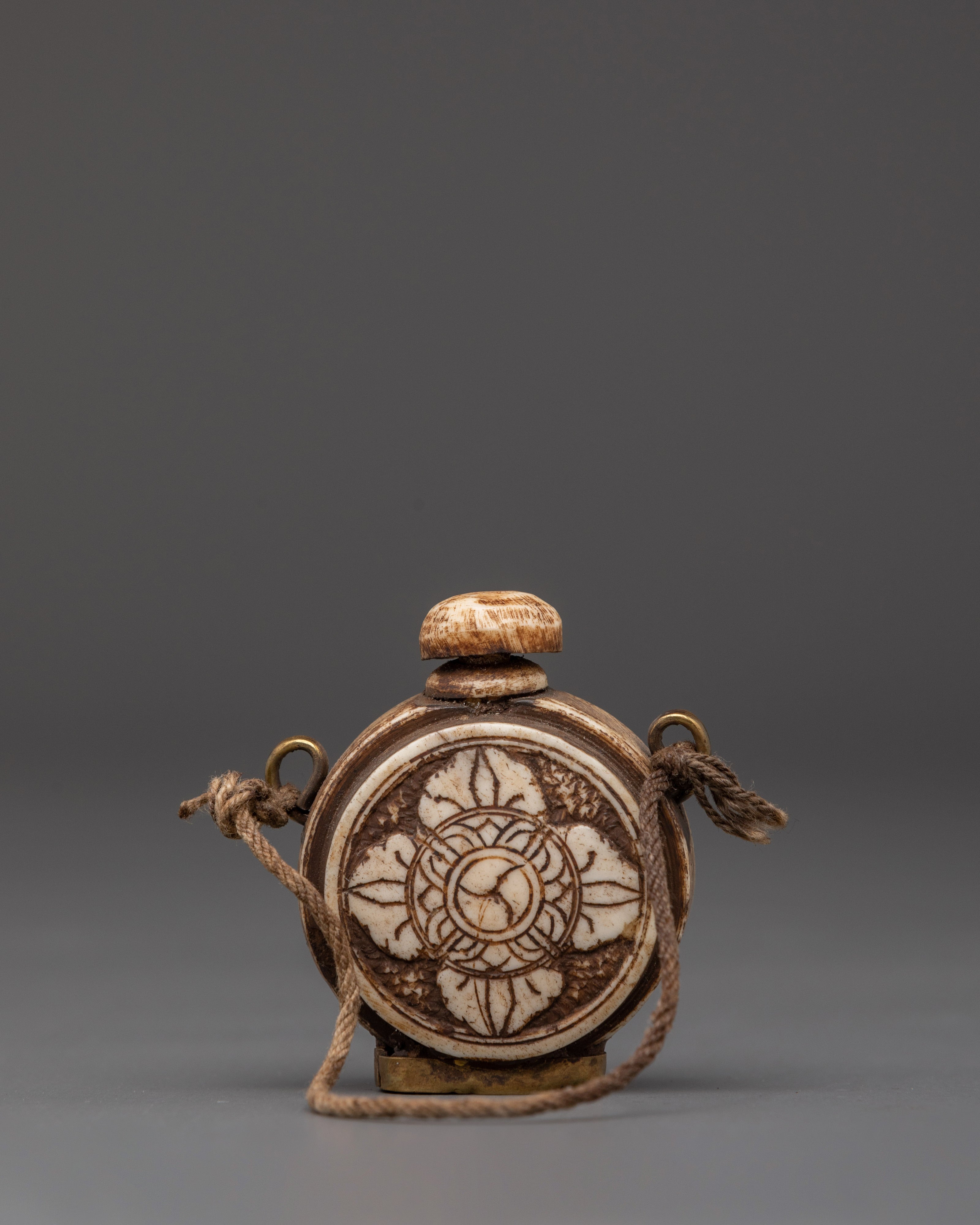 Tibetan Ritual Snuff Bottle in Carved Buffalo Bone
