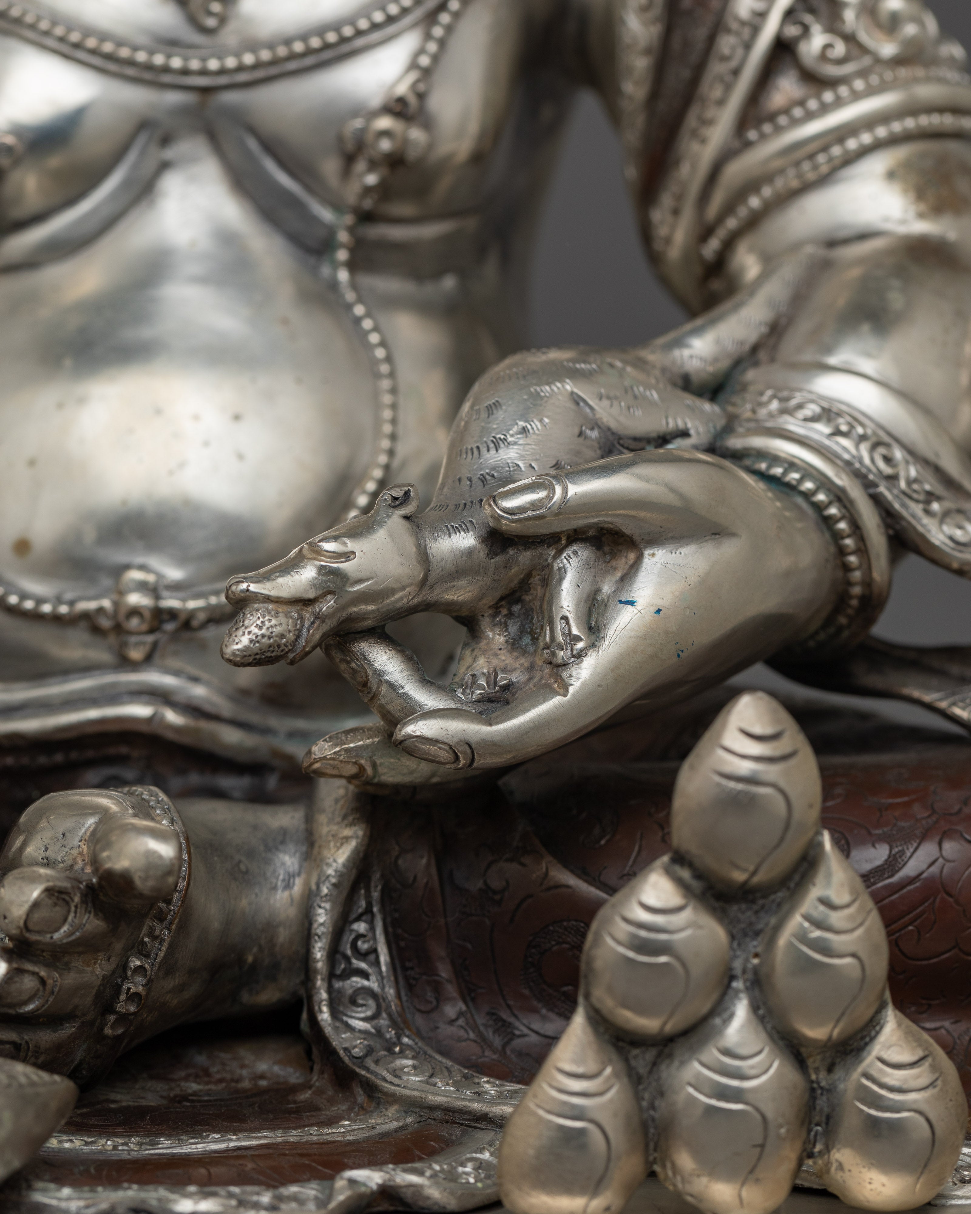 Silver Plated Dzambhala Statue | The Deity of Wealth and Abundance