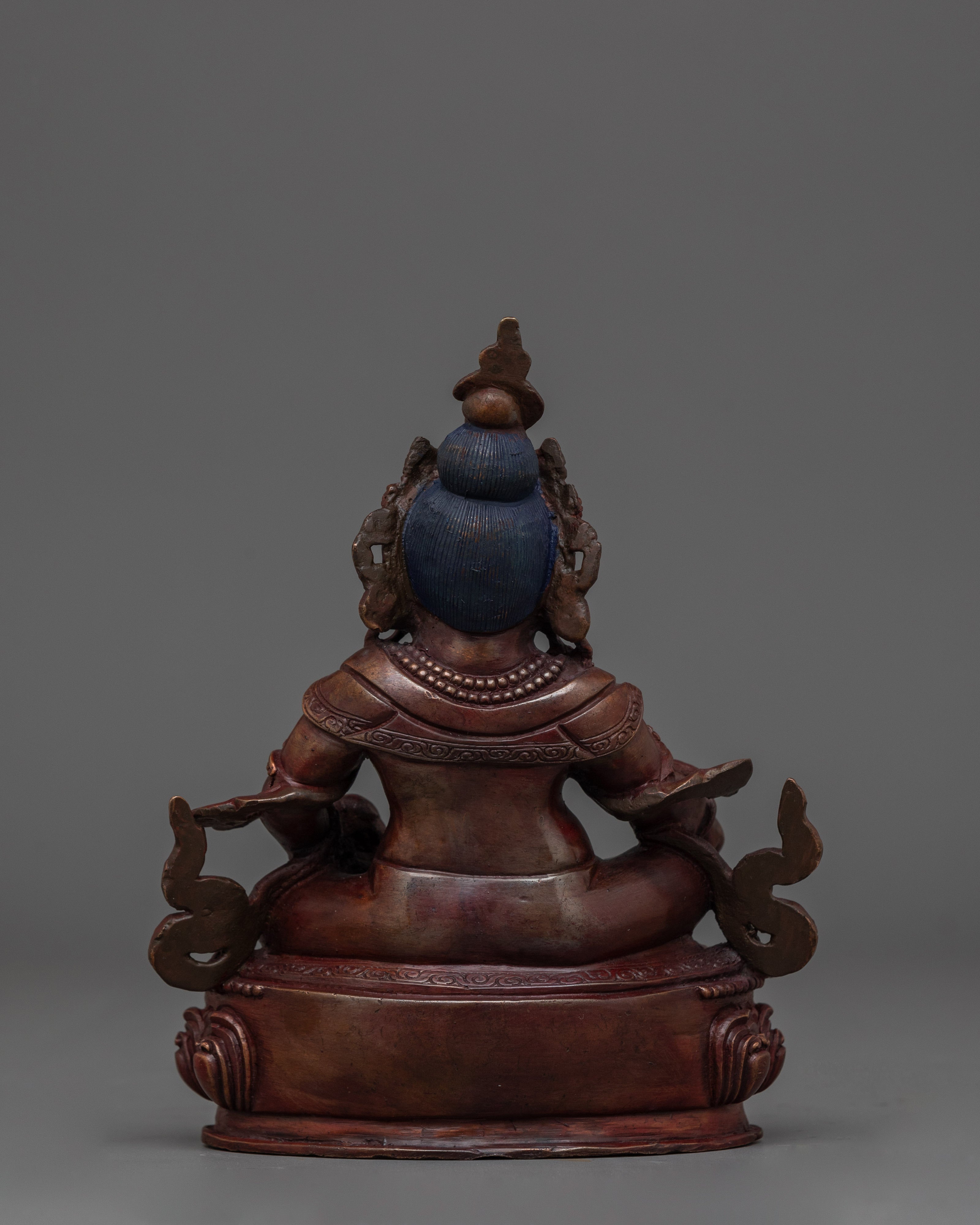 Dzambhala with Oxidized Copper Body Statue | The Embodiment of Prosperity
