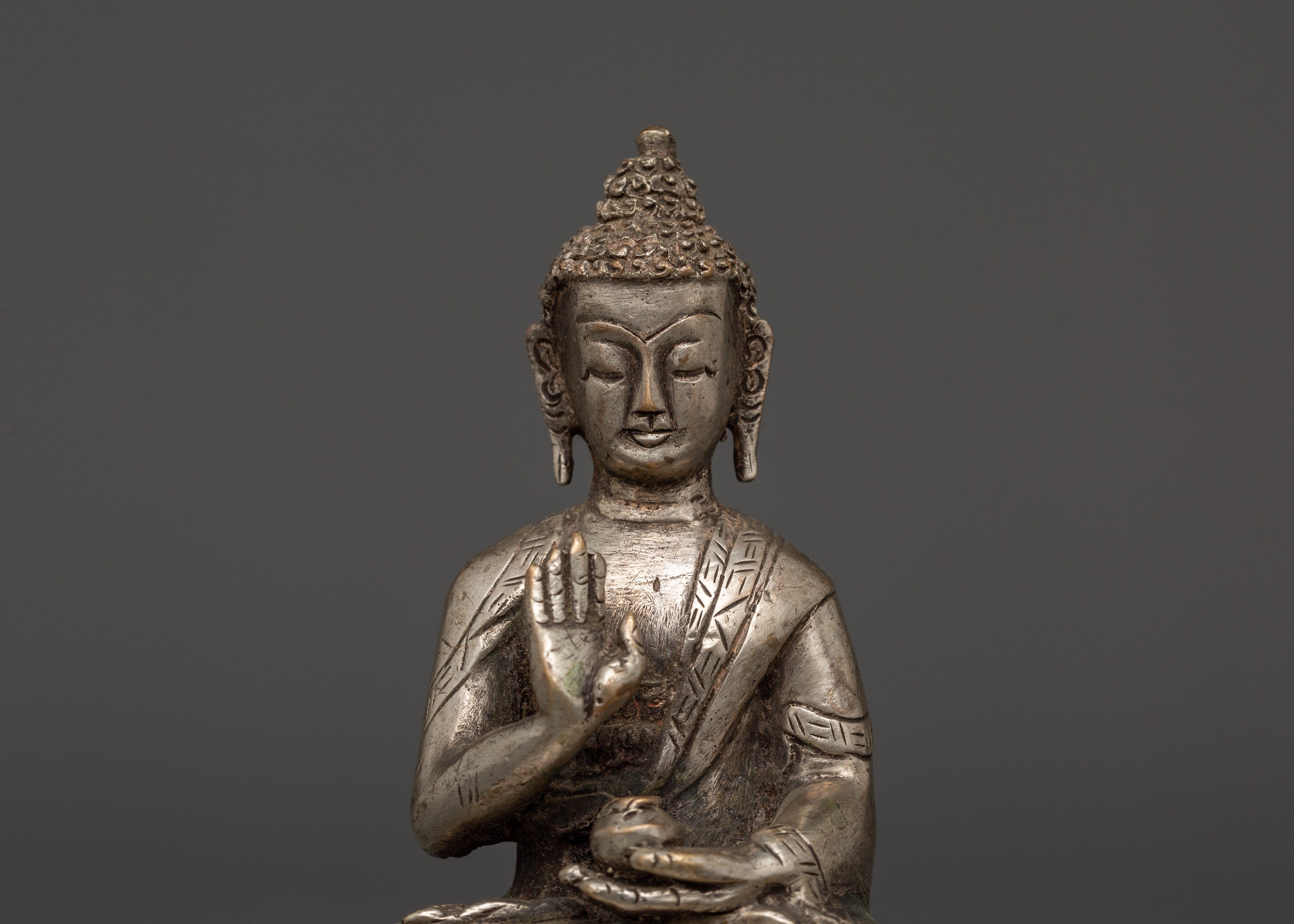 Handmade Amoghasiddhi Buddha Statue | Silver-Plated Copper Body