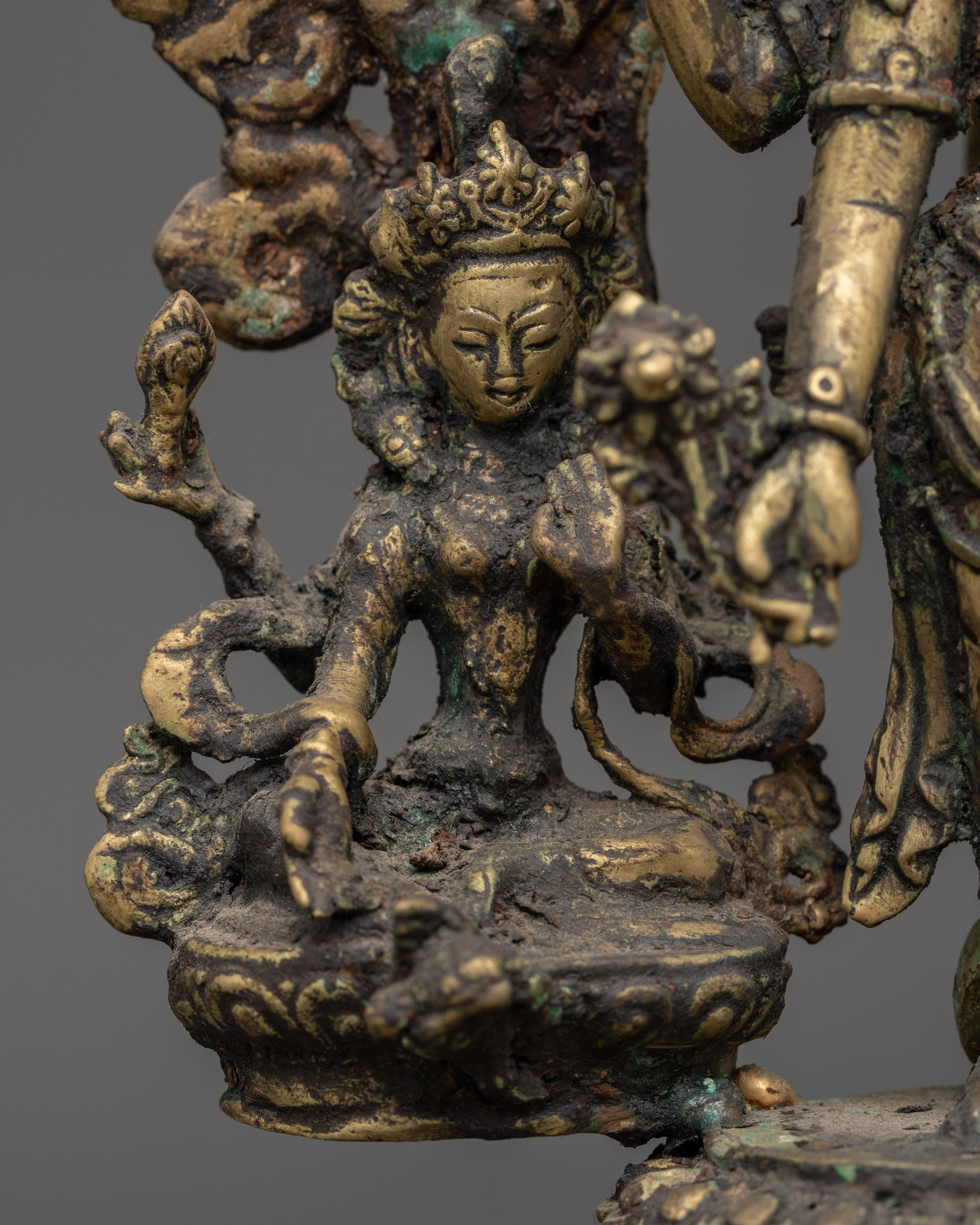 Brass Oil Lamp - Decorated with Avalokiteshvara, Vasudhara & Ganesh