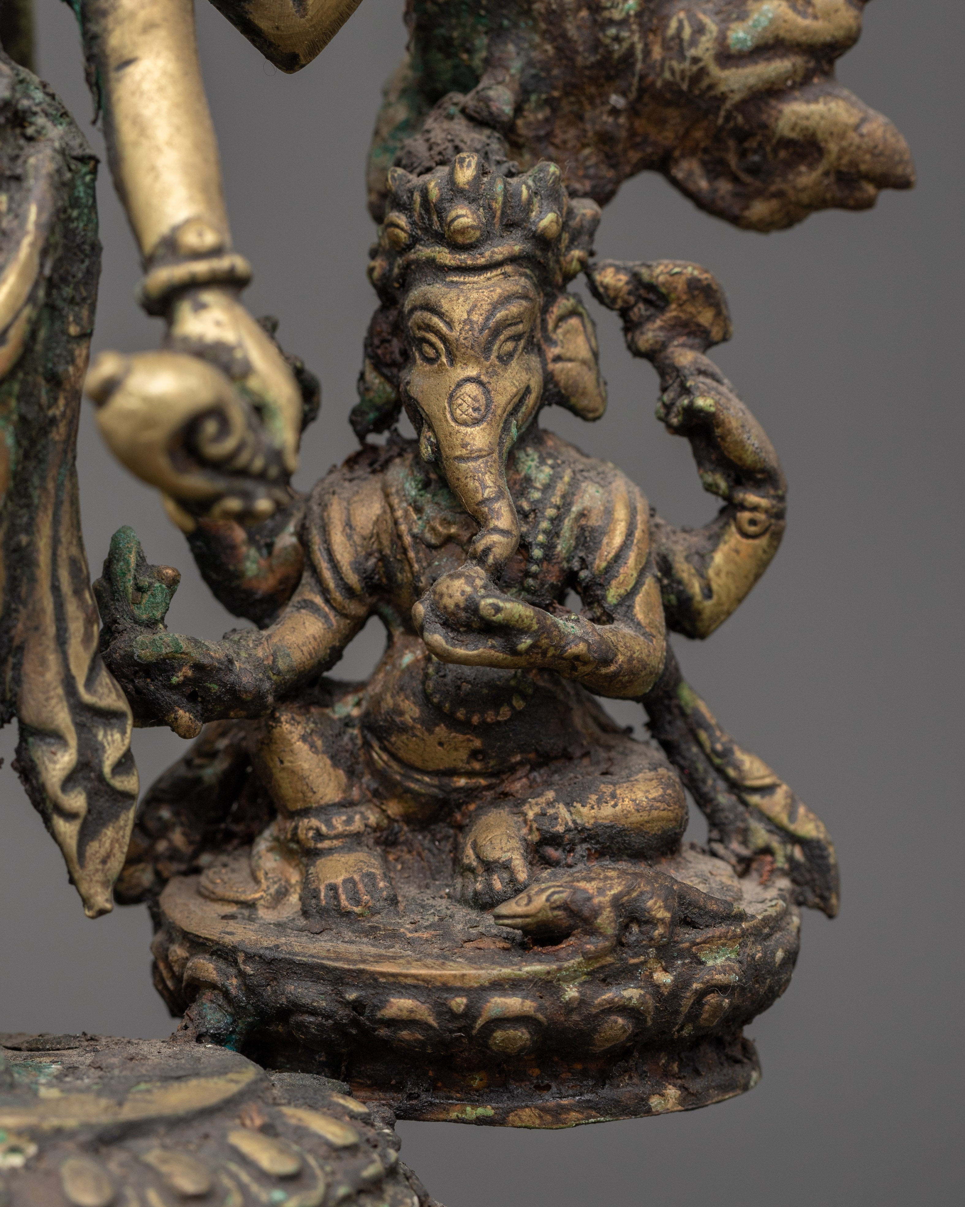 Brass Oil Lamp - Decorated with Avalokiteshvara, Vasudhara & Ganesh