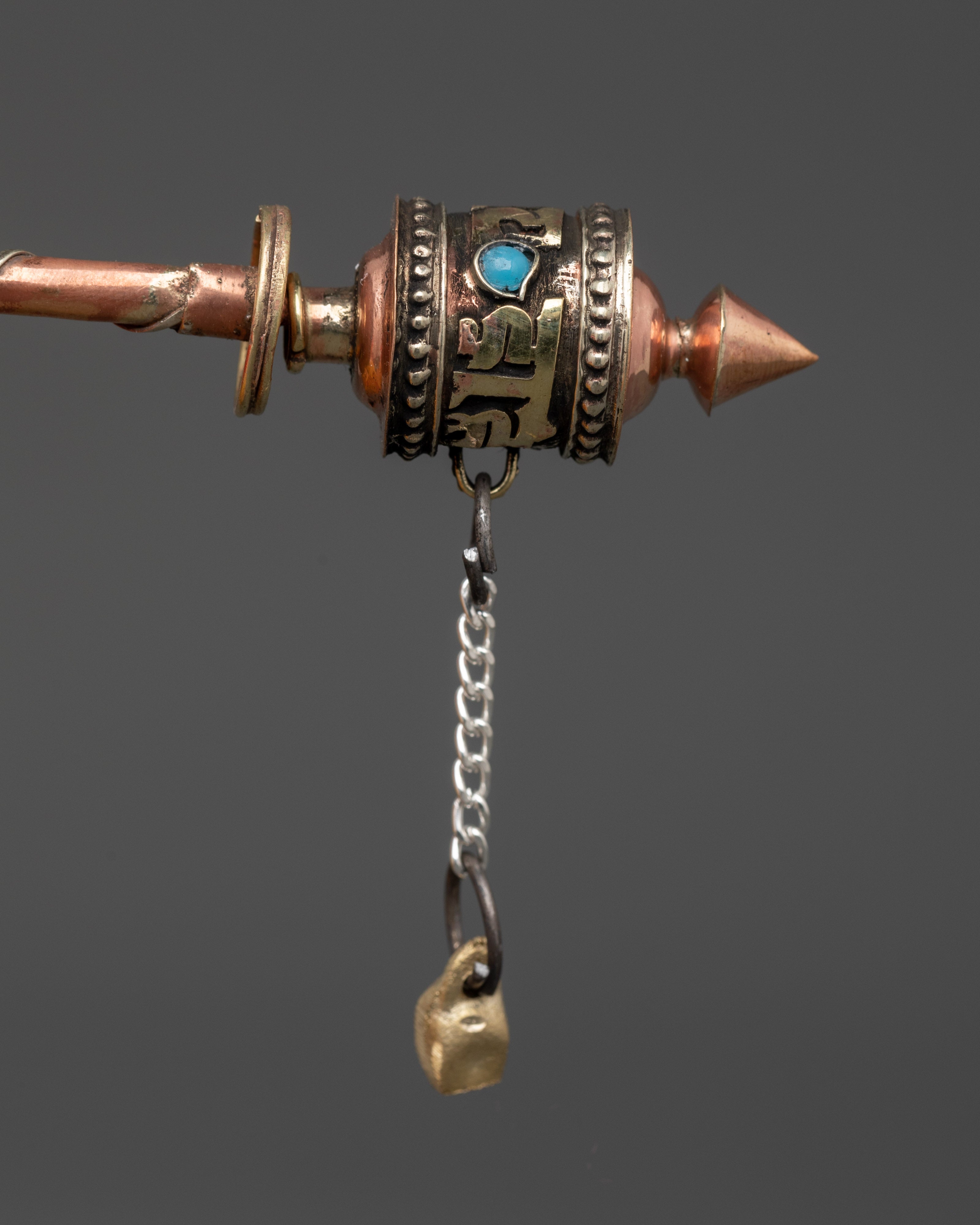 Handheld Tibetan prayer wheel in copper | Mindfulness & Spiritual Practice