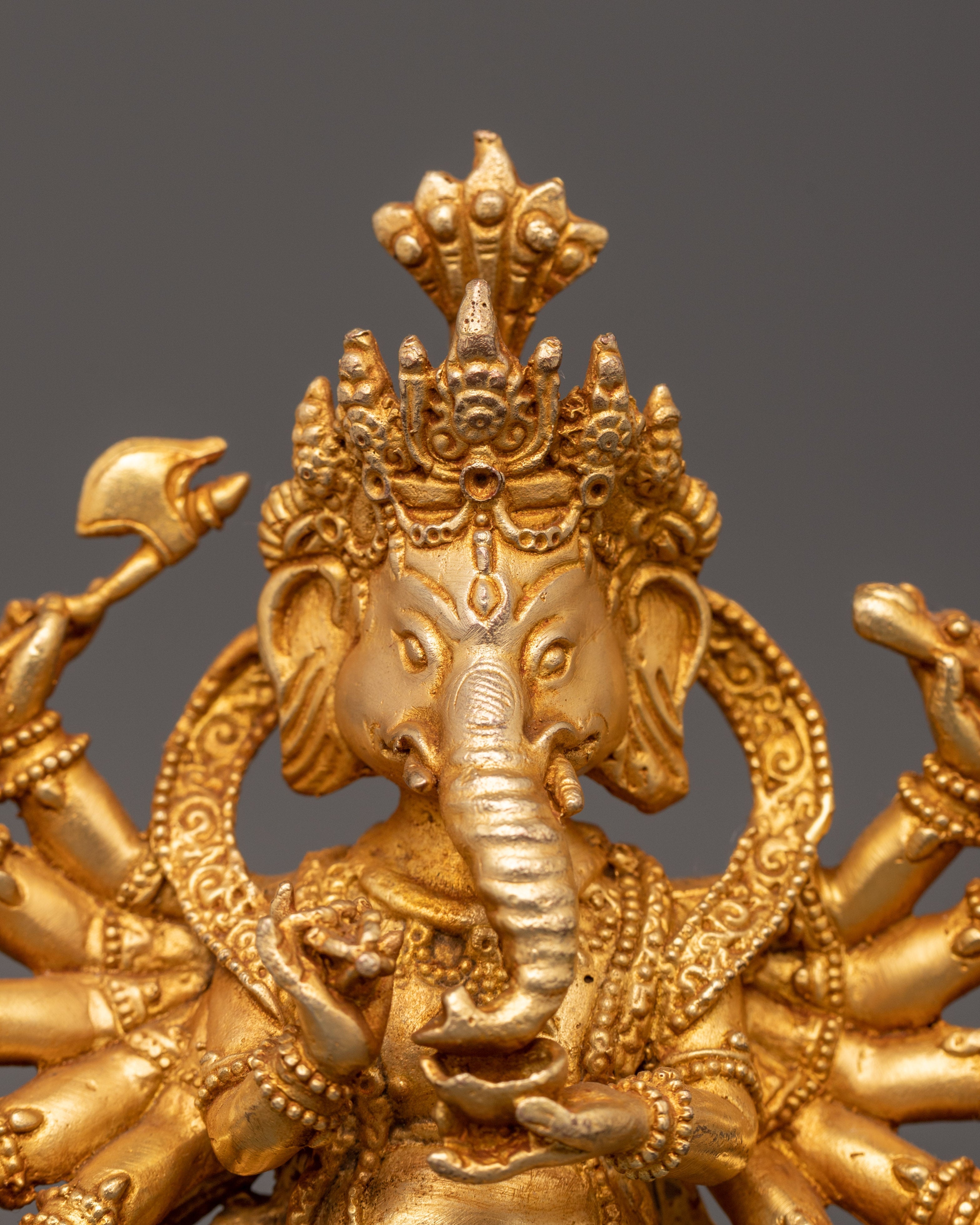 Ganesha Statue with One Leg Raised & Multiple Arms | Ganapati in Copper
