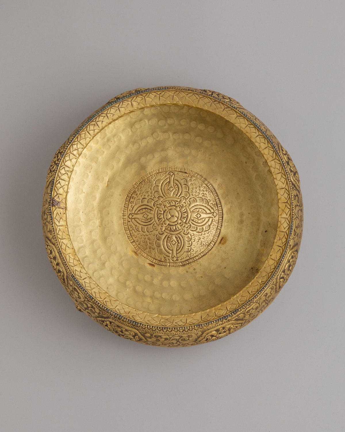 Decorative Urli Bowl | Brass Vessel with Auspicious Symbol Carving