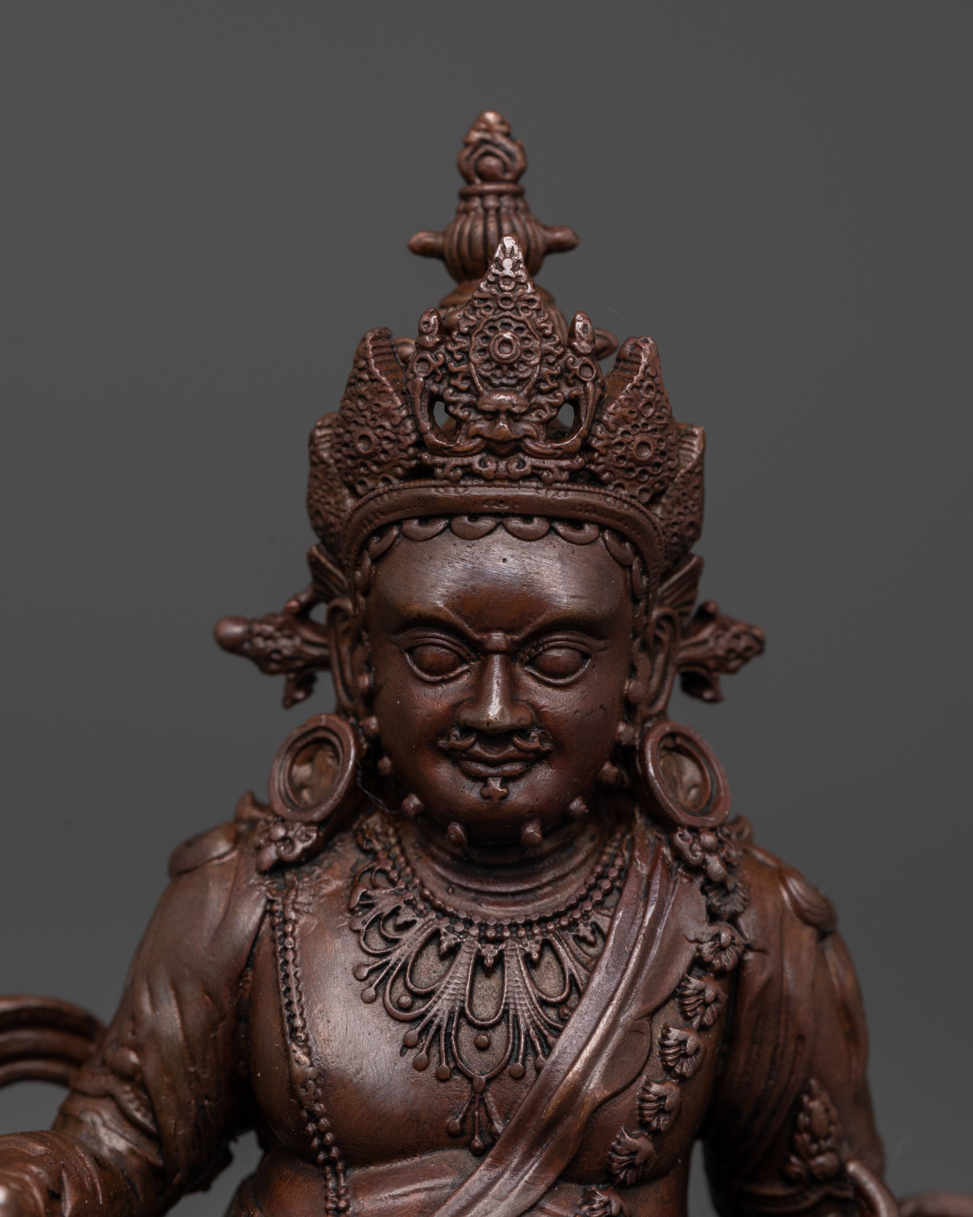 Oxidized Copper Dzambala Holding Conch | Tibetan Wealth Deity