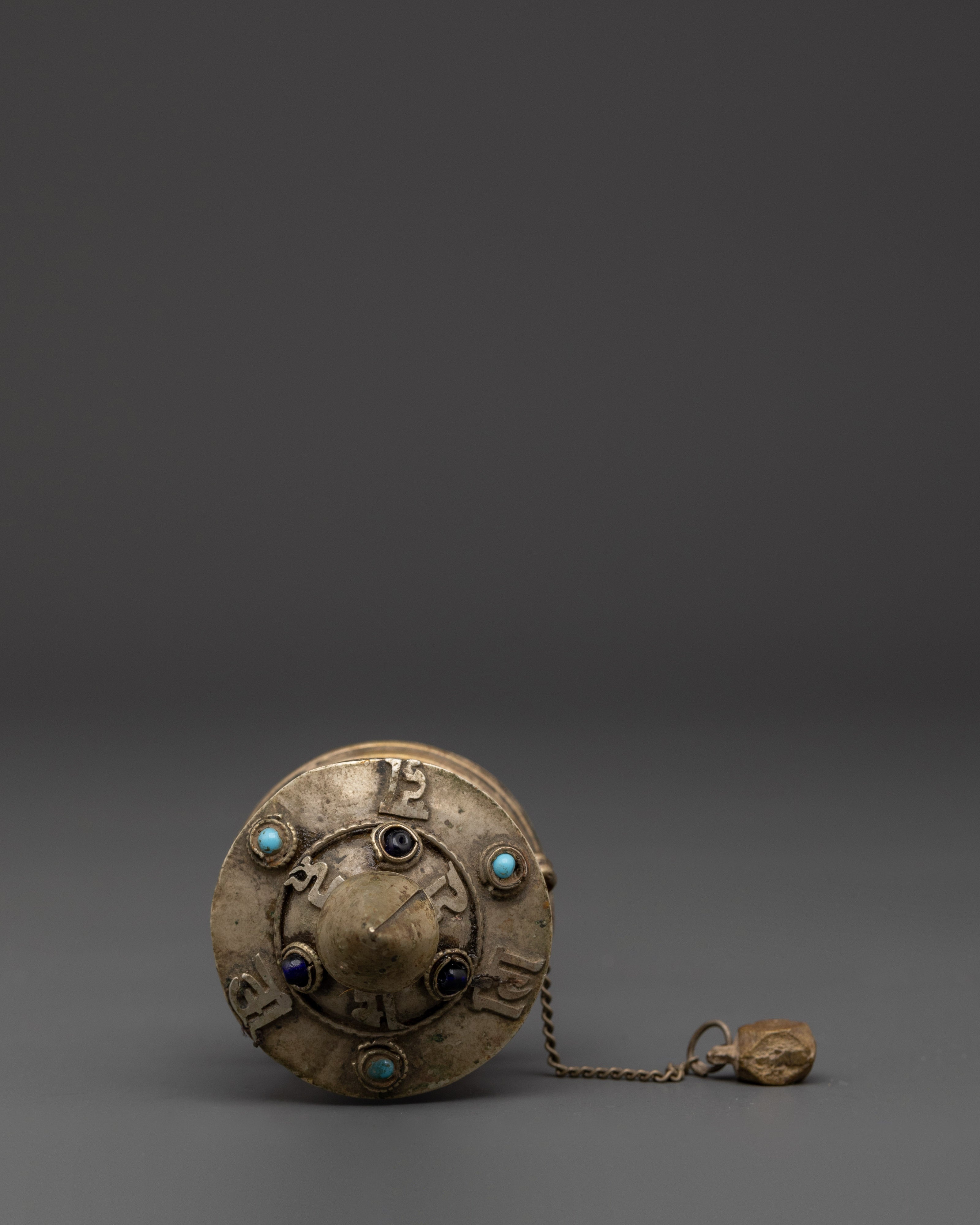 Sacred Buddhist Spinning Mantra Wheel | Wooden Handle, White Metal, and Turquoise Stones