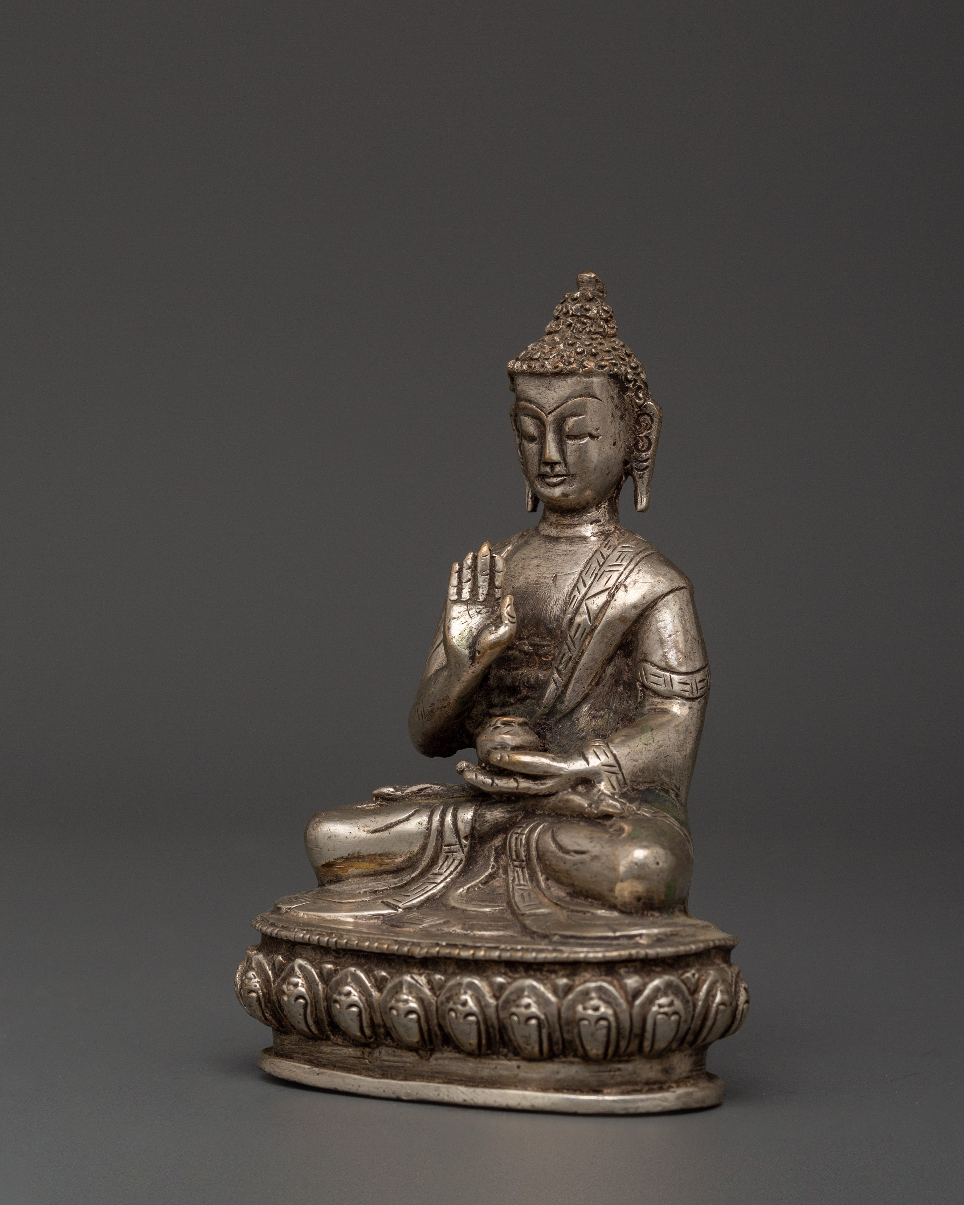 Handmade Amoghasiddhi Buddha Statue | Silver-Plated Copper Body
