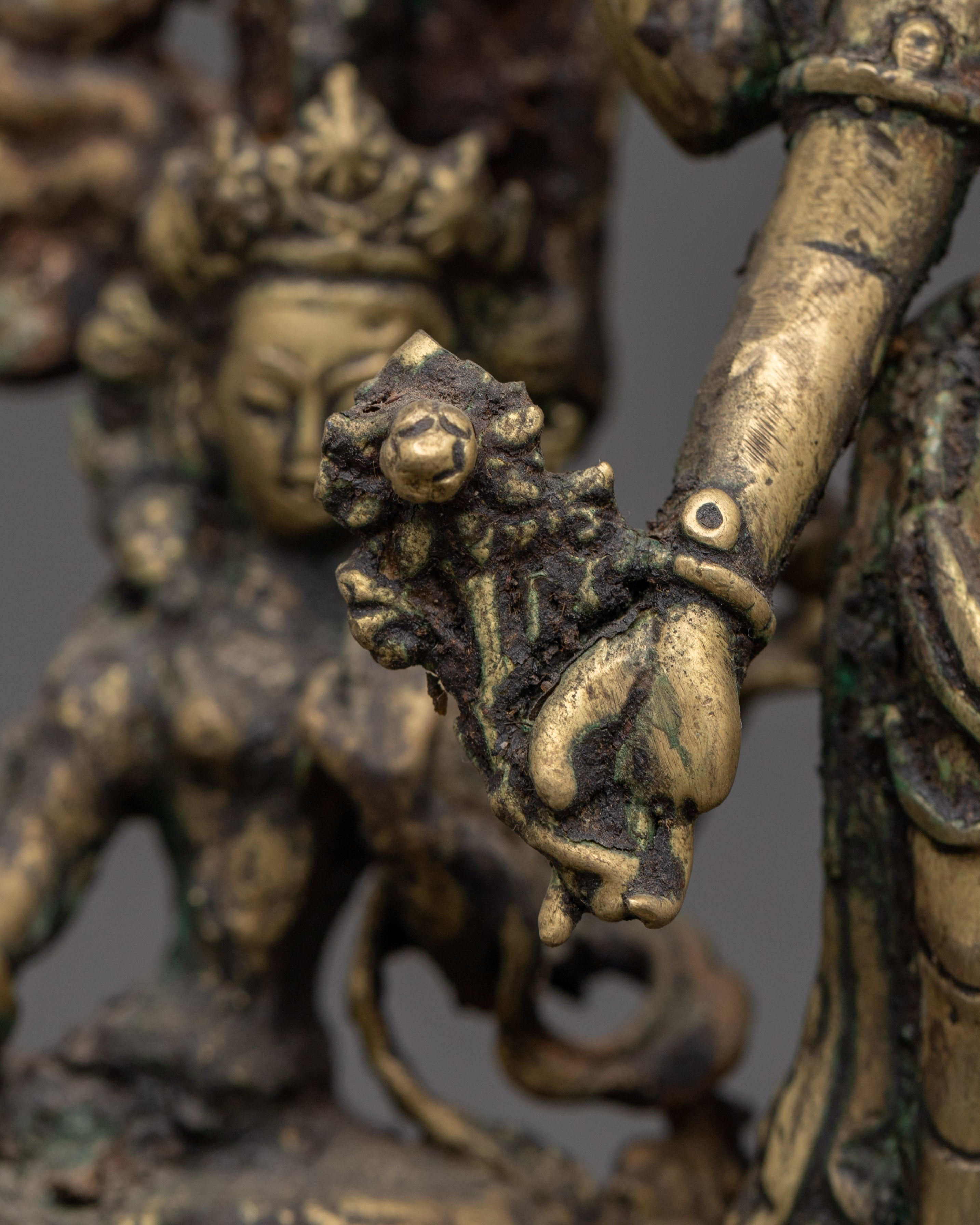 Brass Oil Lamp - Decorated with Avalokiteshvara, Vasudhara & Ganesh