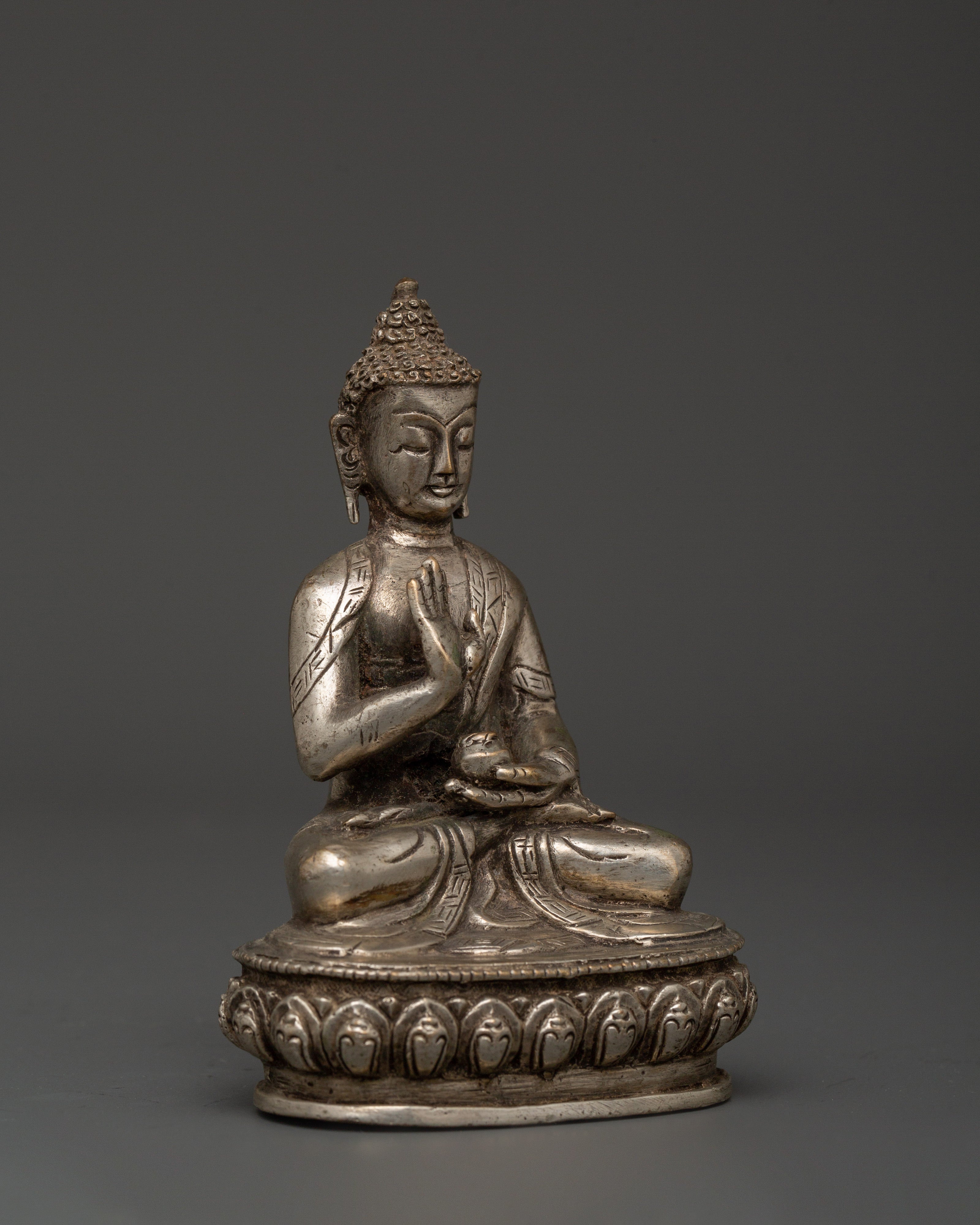 Handmade Amoghasiddhi Buddha Statue | Silver-Plated Copper Body