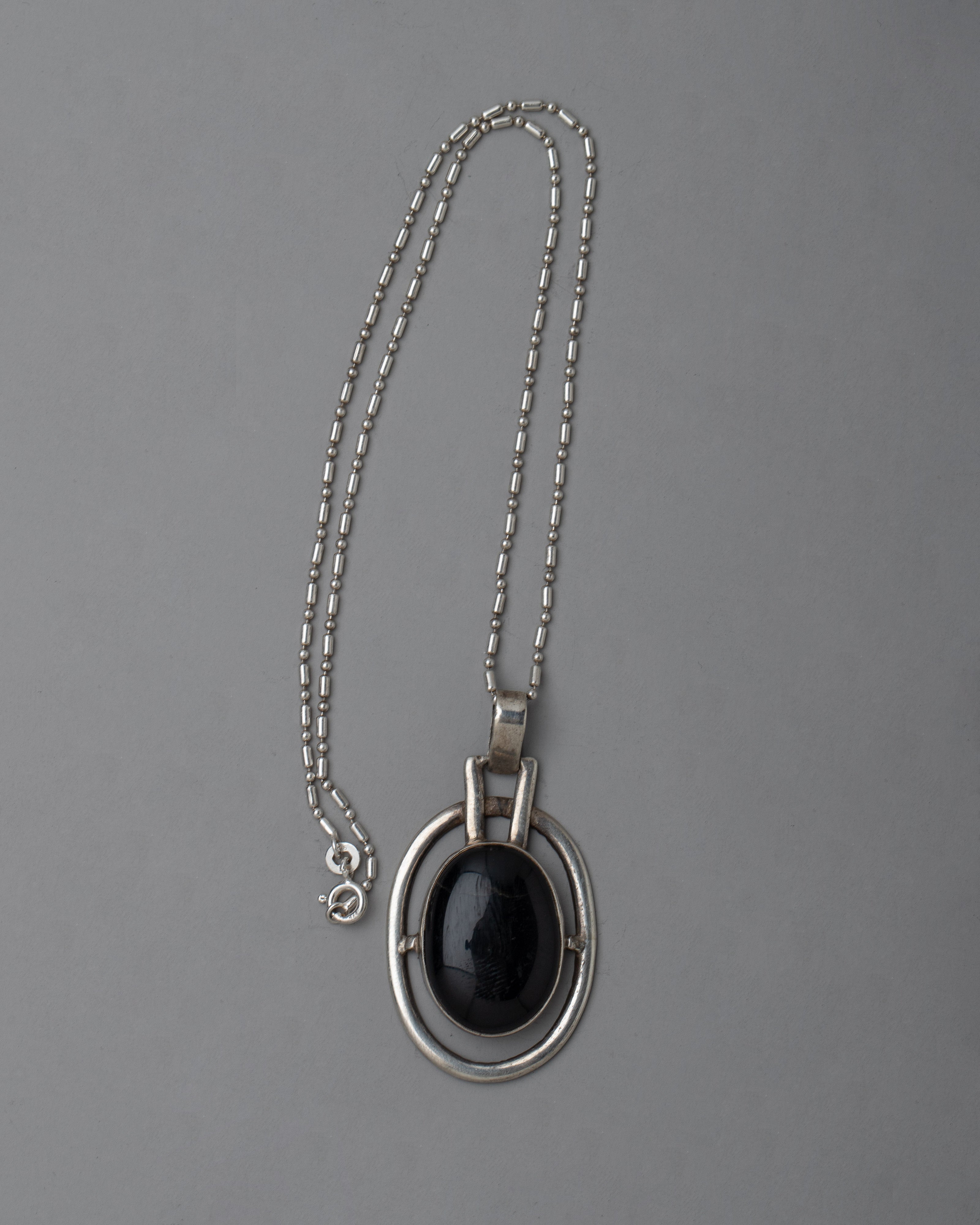 Silver Onyx Locket | Distinctive Piece for Spiritual Well-being