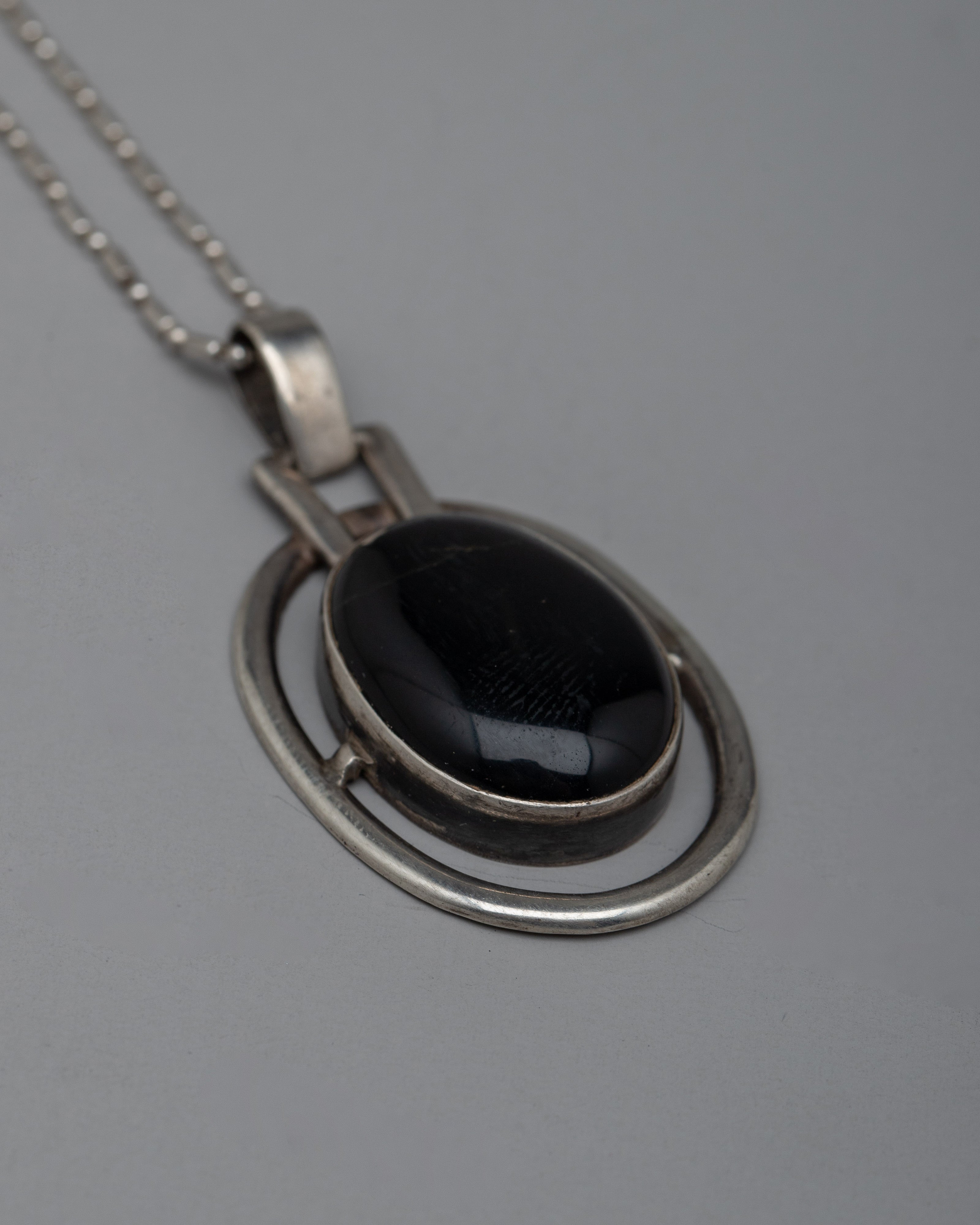 Silver Onyx Locket | Distinctive Piece for Spiritual Well-being