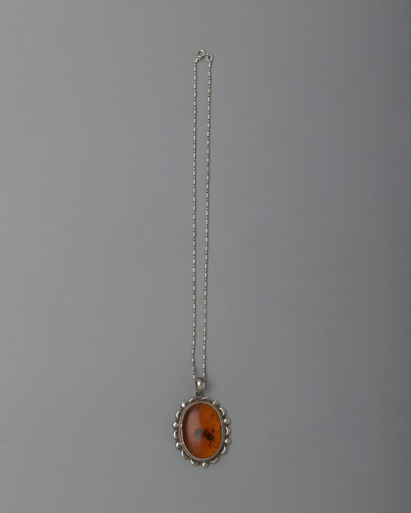 Silver Amber Pendent | Classic Beauty with a Touch of Nature