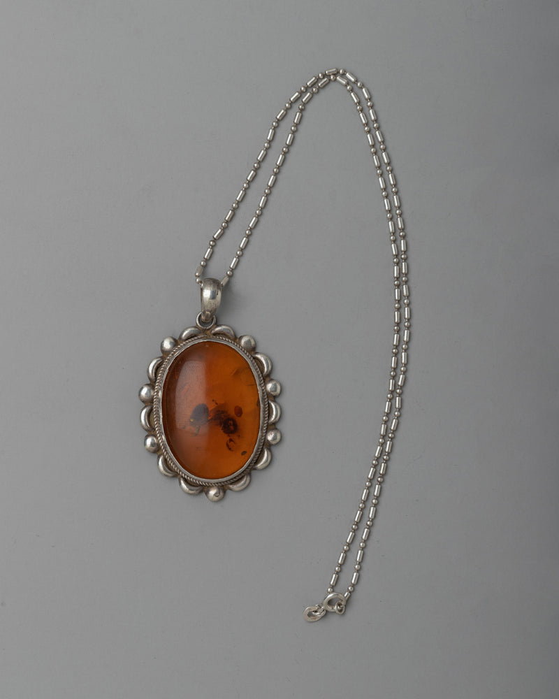 Silver Amber Pendent | Classic Beauty with a Touch of Nature