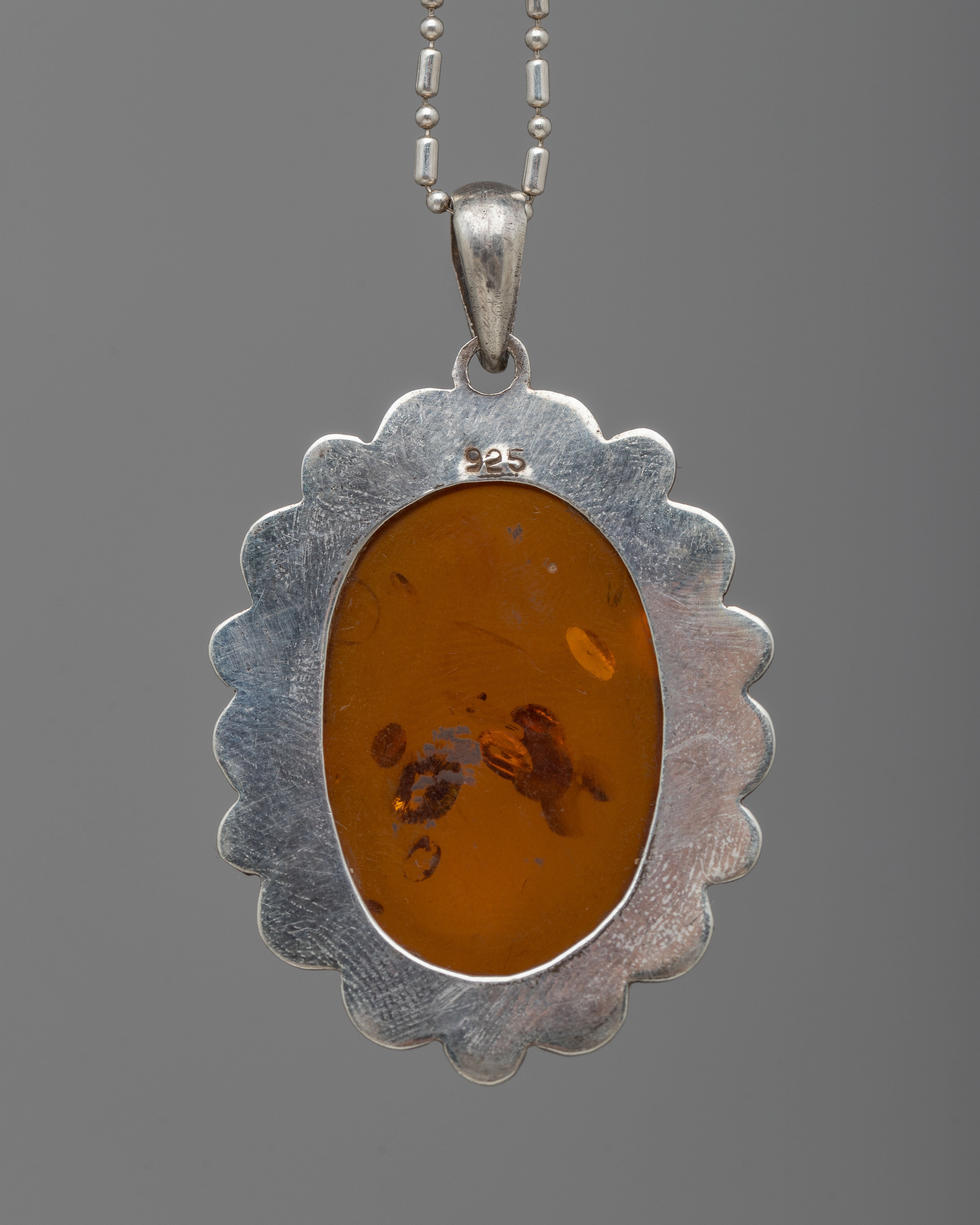 Silver Amber Pendent | Classic Beauty with a Touch of Nature